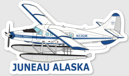 Sticker of a seaplane with 'Juneau Alaska' text on a gray background
