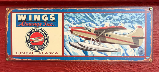 Flightseeing Metal Sign